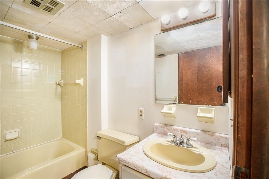 528 MacBeth Drive Pittsburgh, PA 15235 - Photo 15 of 20 a bathroom with a sink a toilet and shower