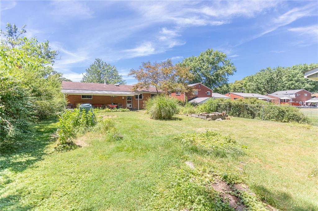 528 MacBeth Drive Pittsburgh, PA 15235 - Photo 17 of 20 a swimming pool with trees in the background