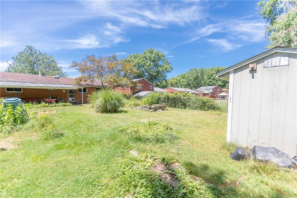 528 MacBeth Drive Pittsburgh, PA 15235 - Photo 20 of 20 a view of a garden with a building in the background