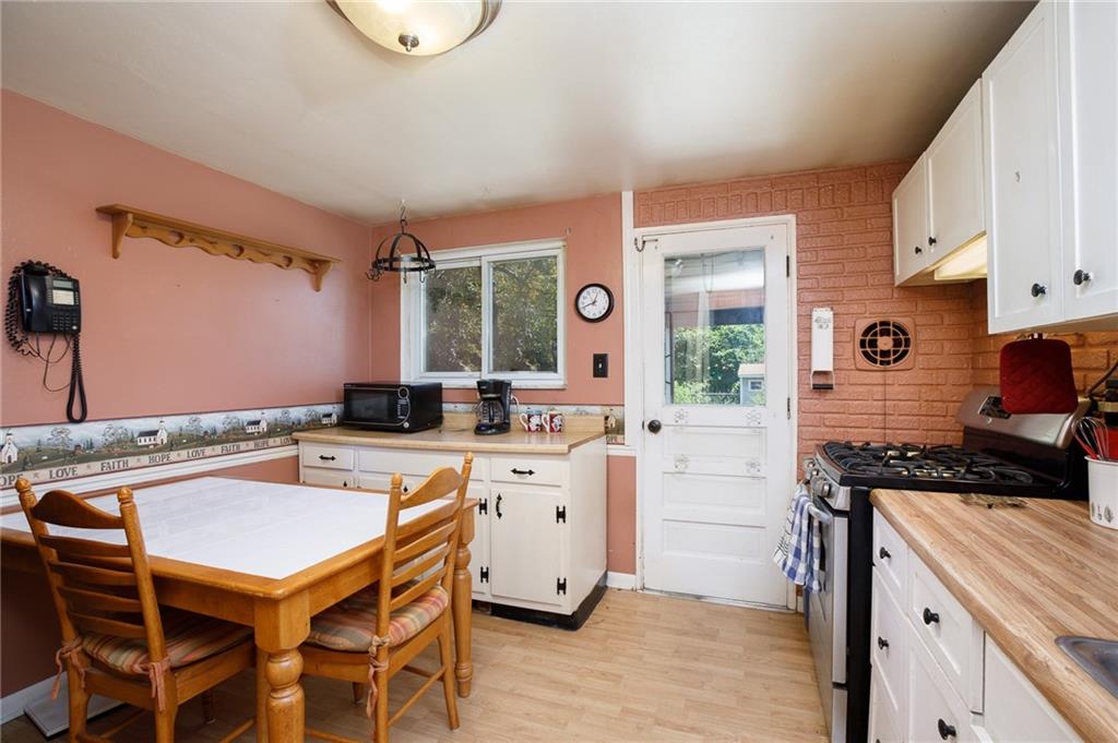528 MacBeth Drive Pittsburgh, PA 15235 - Photo 6 of 20 a kitchen with a stove a sink and a refrigerator