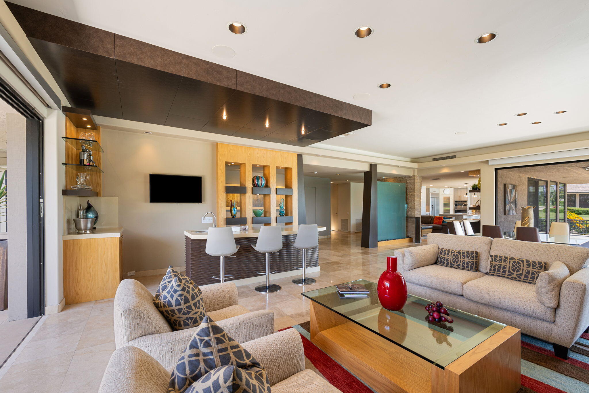 4 Barnard Court Rancho Mirage, CA 92270 - Photo 16 of 62 a living room with furniture and a flat screen tv