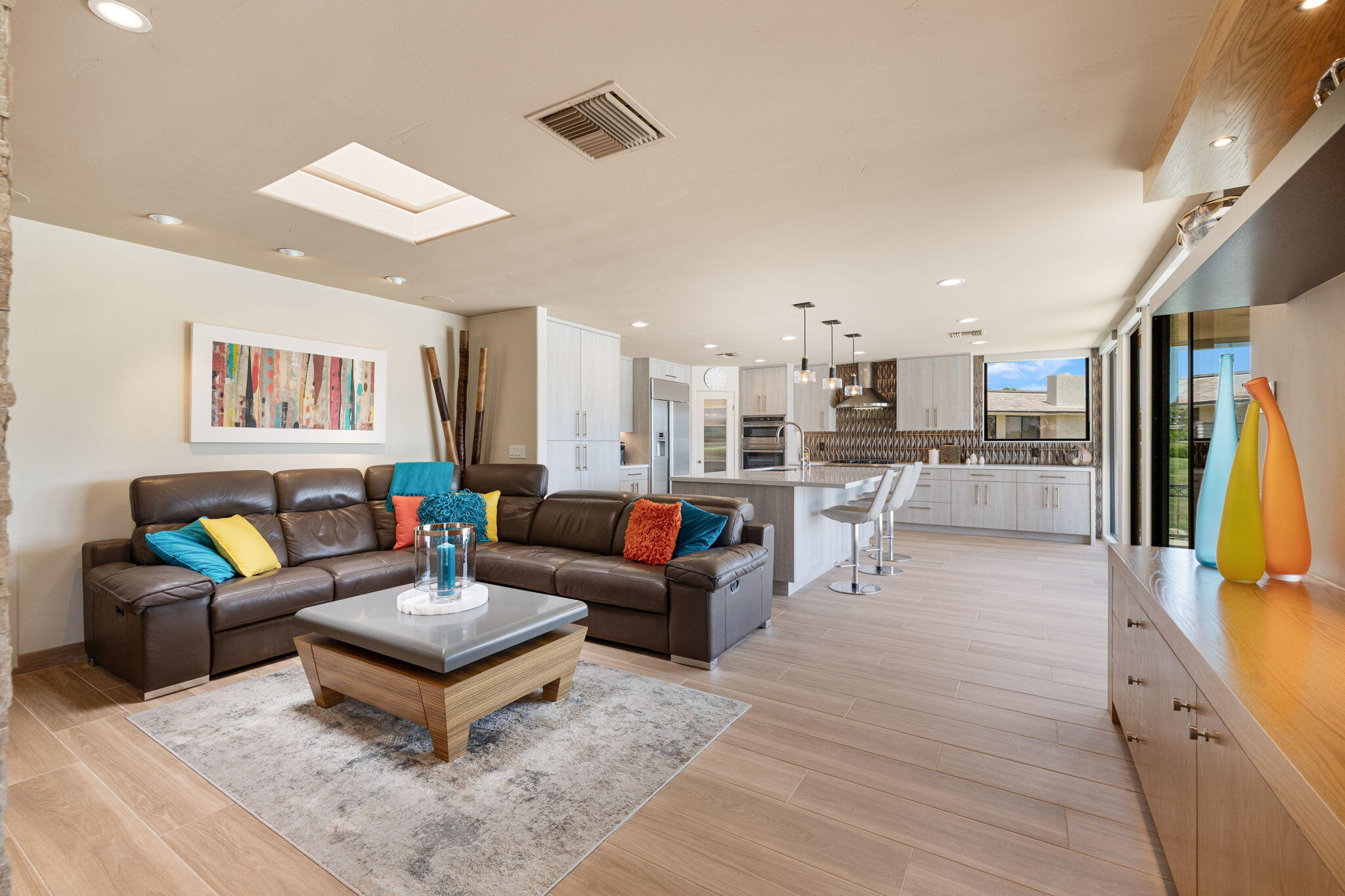 4 Barnard Court Rancho Mirage, CA 92270 - Photo 29 of 62 a living room with furniture and a view of kitchen