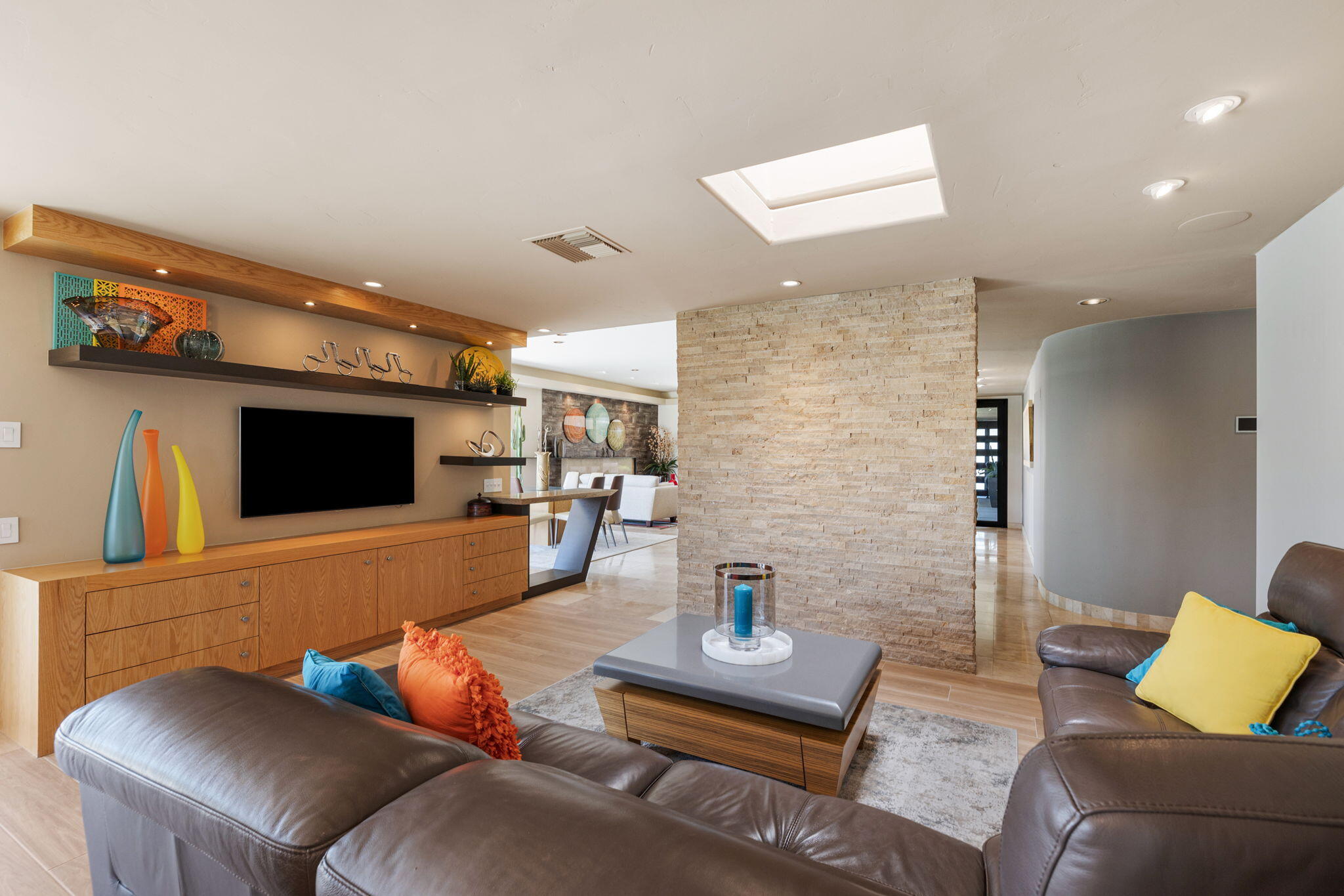4 Barnard Court Rancho Mirage, CA 92270 - Photo 31 of 62 a living room with furniture and a flat screen tv