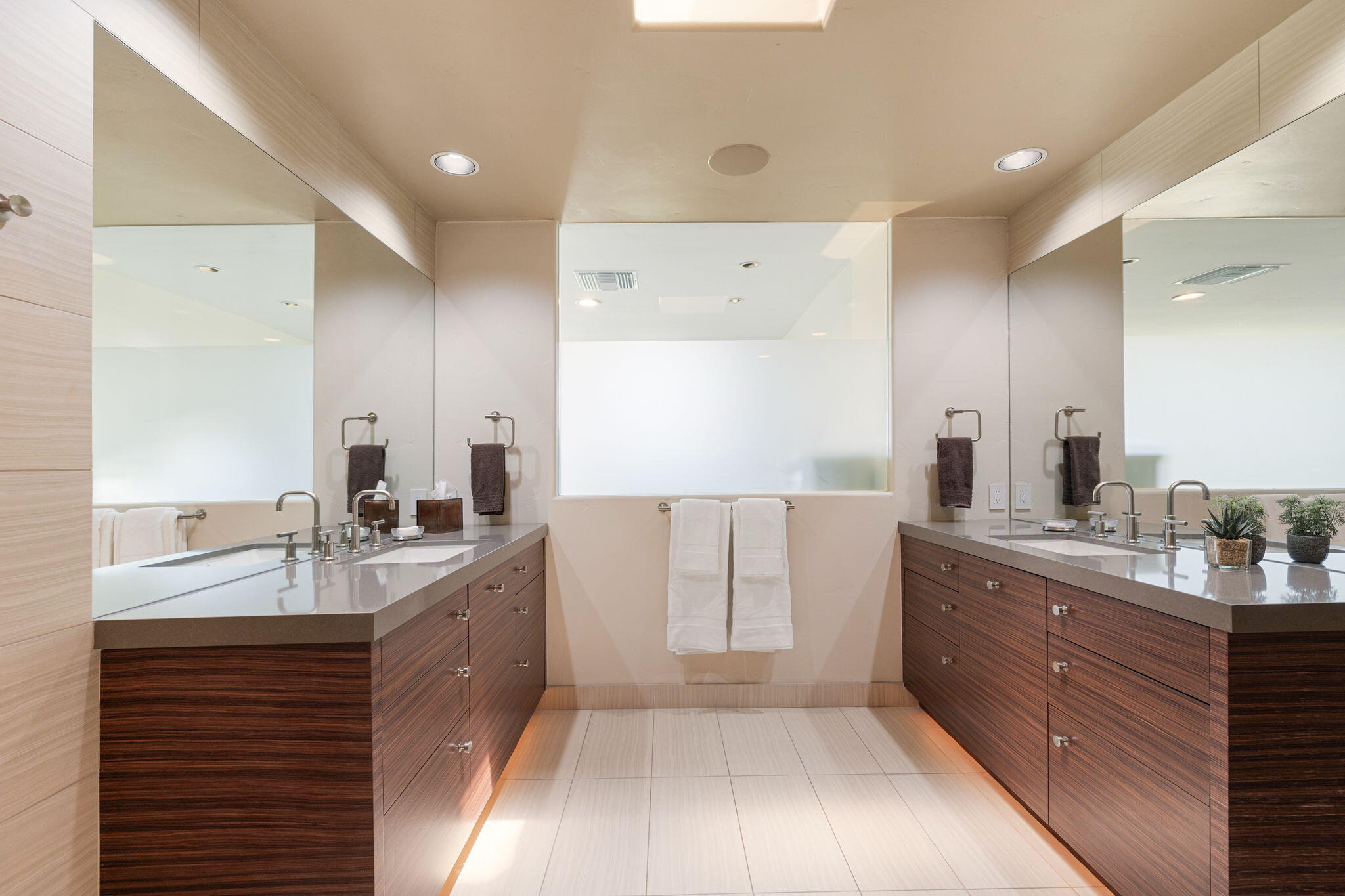 4 Barnard Court Rancho Mirage, CA 92270 - Photo 38 of 62 a bathroom with a granite countertop double vanity sink a mirror and a bathtub