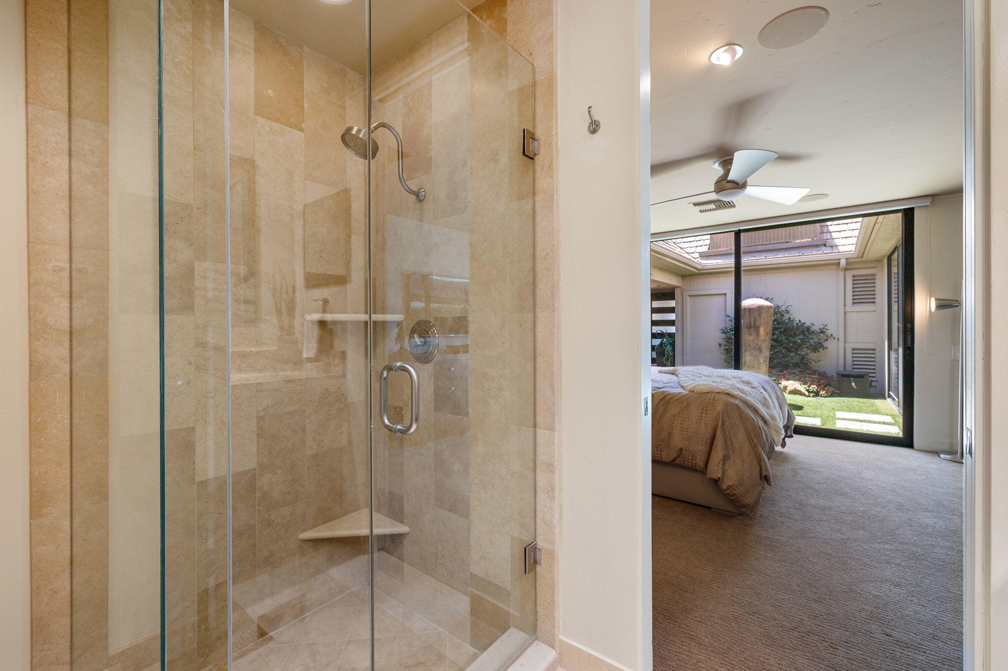 4 Barnard Court Rancho Mirage, CA 92270 - Photo 50 of 62 a bedroom with a bed and a shower