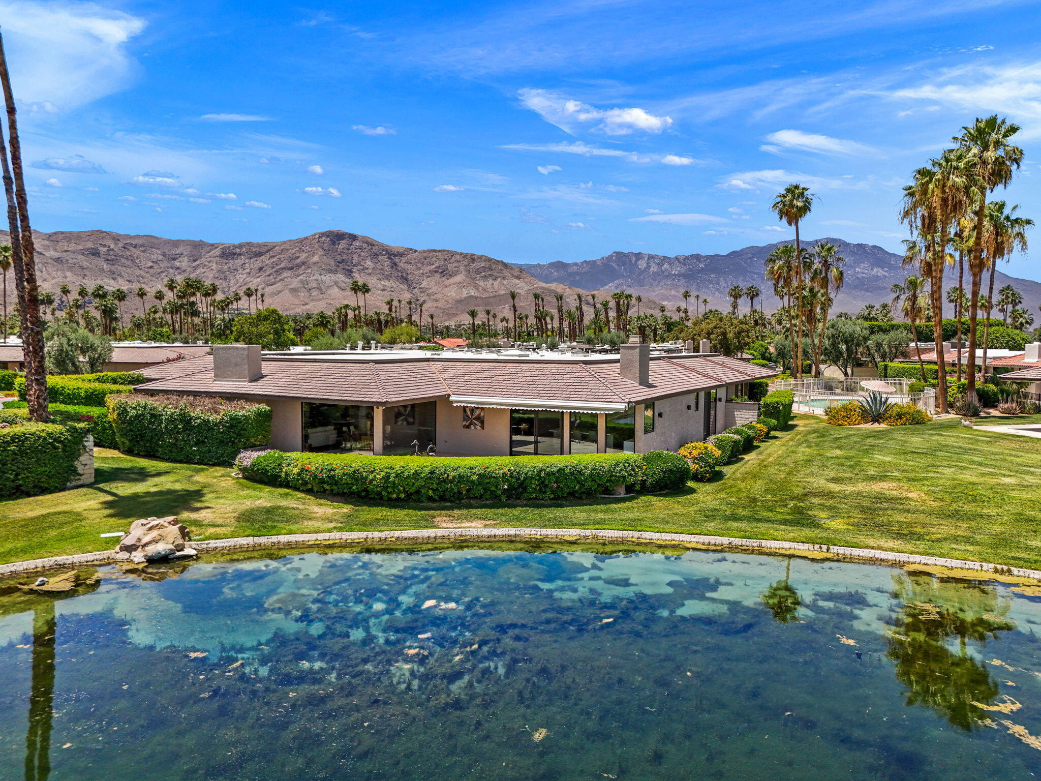 4 Barnard Court Rancho Mirage, CA 92270 - Photo 59 of 62 a view of a house with a yard