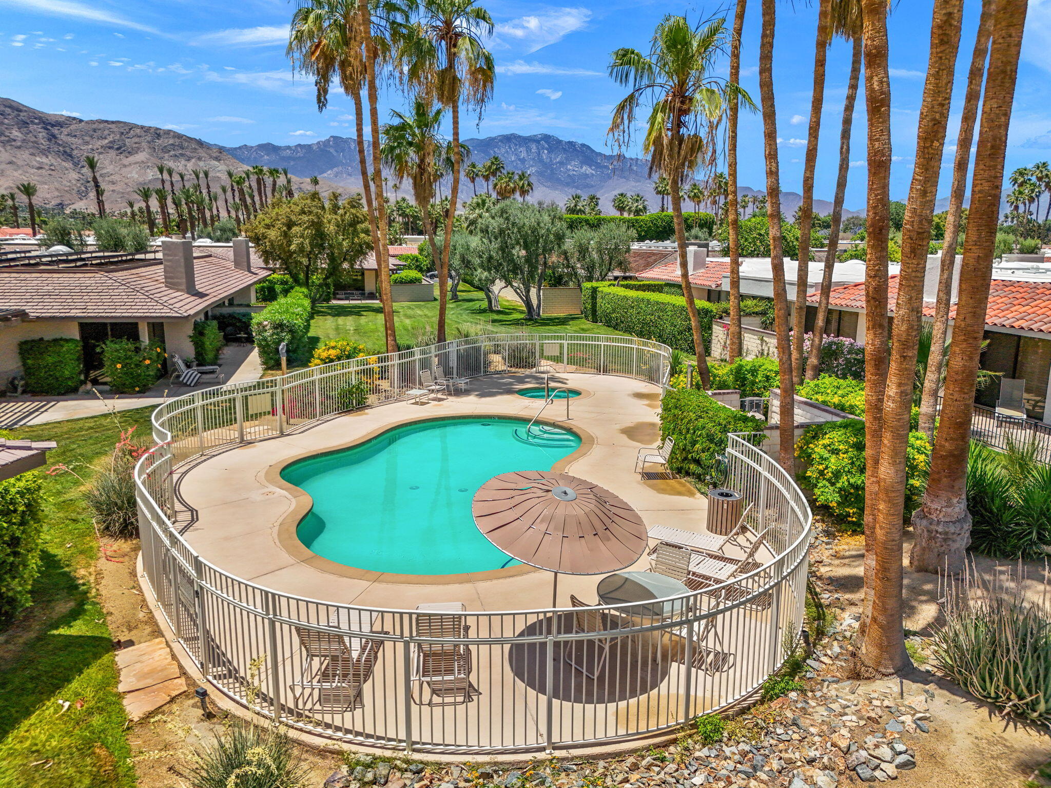 4 Barnard Court Rancho Mirage, CA 92270 - Photo 62 of 62 a view of a chairs and table in the patio
