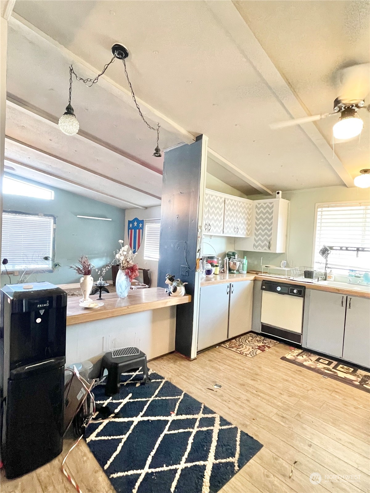 52 Engh Road, Unit 26 Omak, WA 98841 - Photo 13 of 29 a kitchen with a sink appliances and cabinets