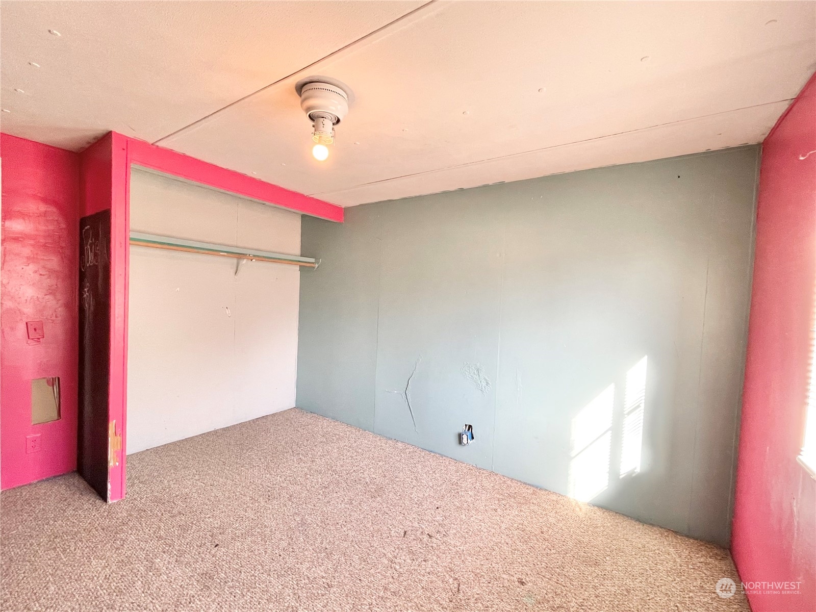 52 Engh Road, Unit 26 Omak, WA 98841 - Photo 21 of 29 a view of a livingroom with an empty space and a window