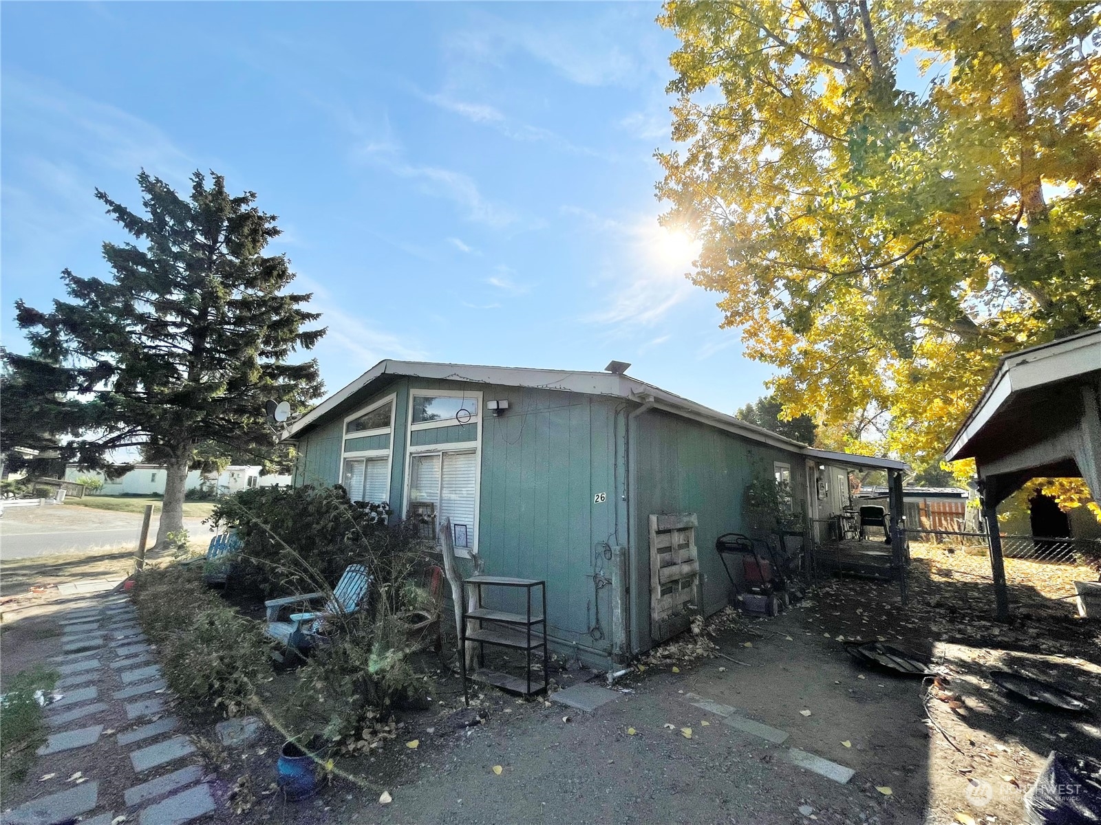 52 Engh Road, Unit 26 Omak, WA 98841 - Photo 3 of 29 a front view of a house with garden