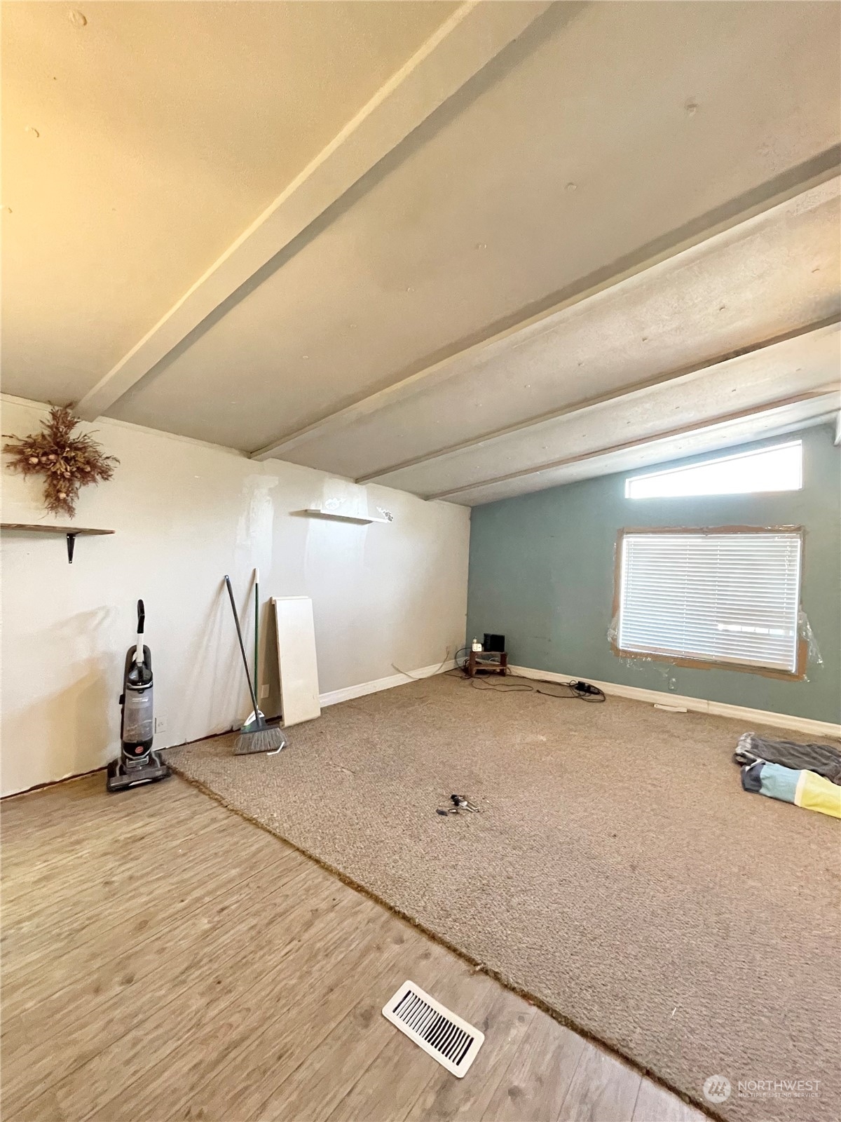 52 Engh Road, Unit 26 Omak, WA 98841 - Photo 7 of 29 a view of a livingroom with a staircase