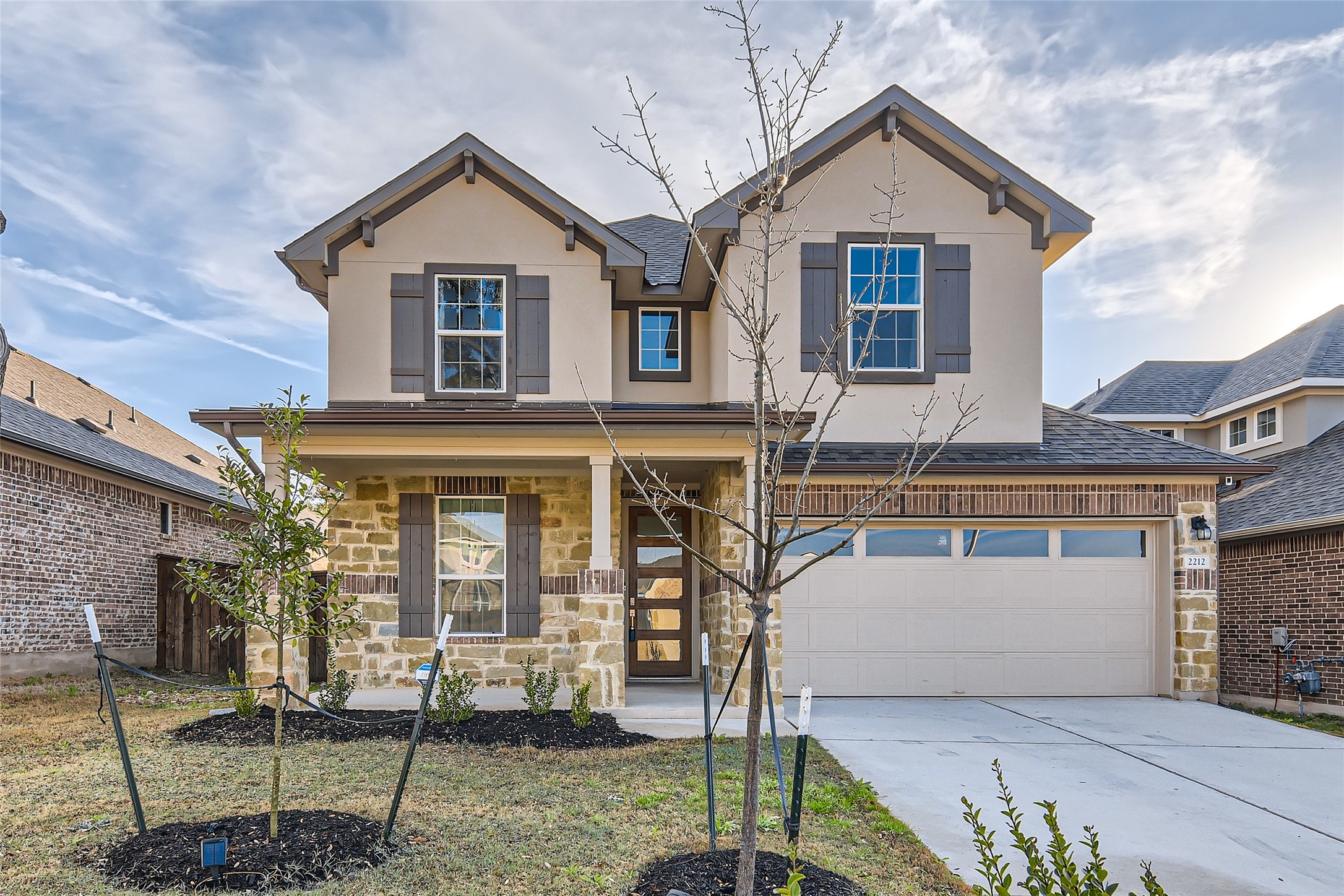 2212 Alamar Walk Leander, TX 78641 - Photo 2 of 29 a front view of a house with a porch