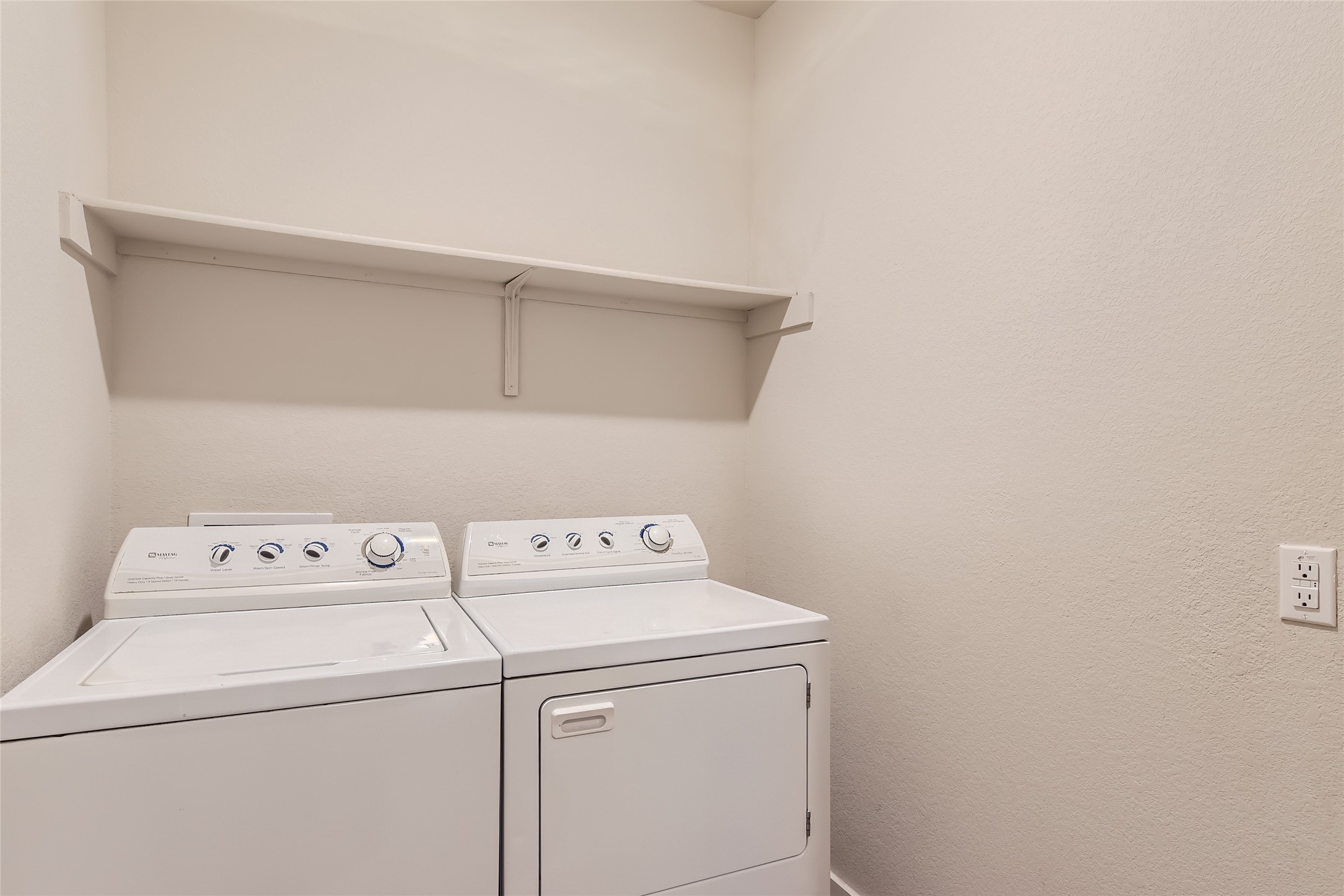 2212 Alamar Walk Leander, TX 78641 - Photo 25 of 29 a utility room with dryer and washer