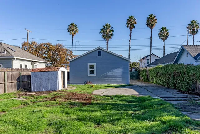 a house view with a garden space