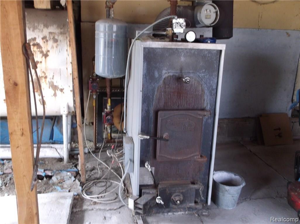 7211 East Deckerville Road Deford, MI 48729 - Photo 28 of 28 Wood Burner.JPG