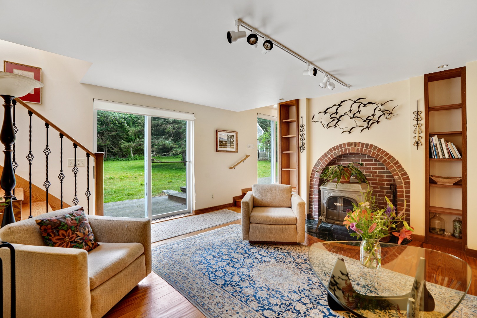174 Middle Road Chilmark, MA 02535 - Photo 12 of 40 a living room with furniture fireplace and a large window