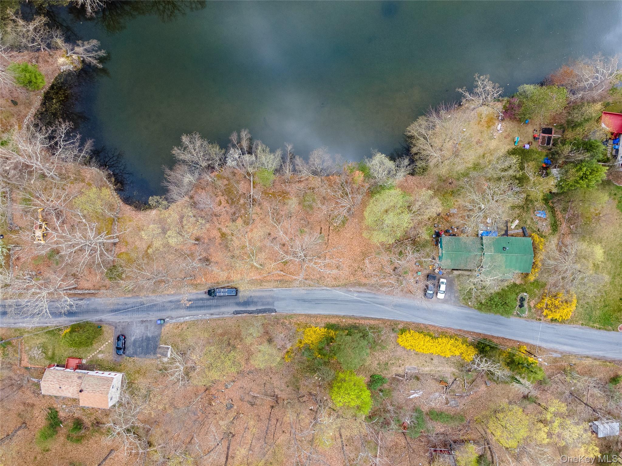 27 East Green Road Rock Tavern, NY 12575 - Photo 14 of 22 a swimming pool with trees in the background