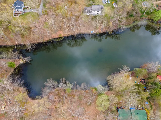 a view of a lake with a house