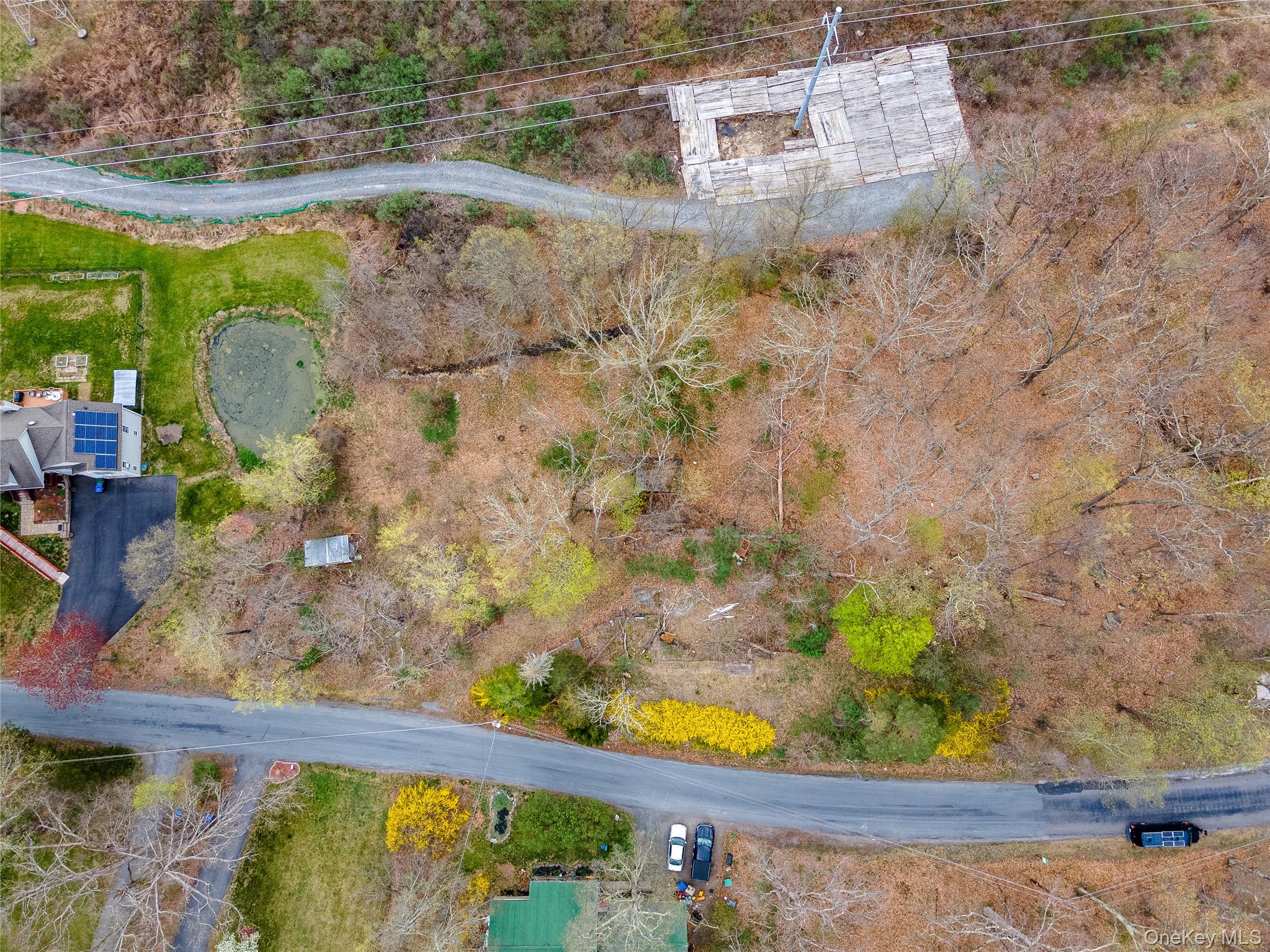 27 East Green Road Rock Tavern, NY 12575 - Photo 3 of 22 a view of a garden with a bench