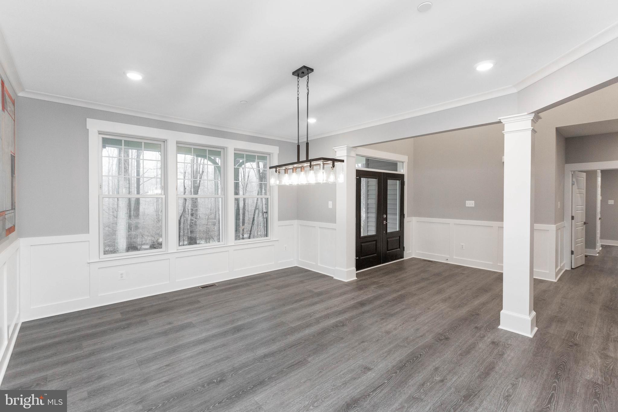 2125 Dixon Road Frederick, MD 21704 - Photo 6 of 57 Foyer opens to piano room.