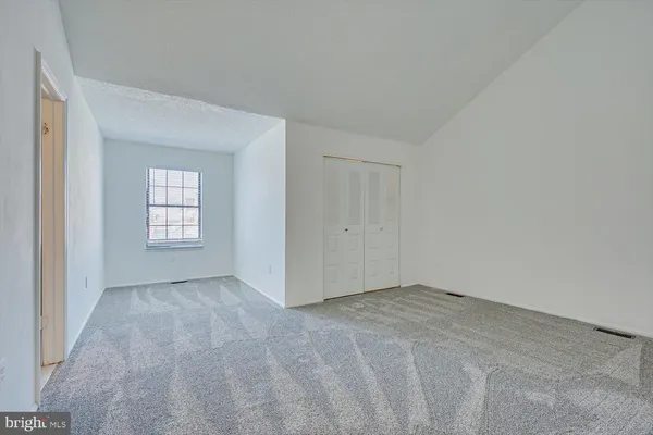 a bathroom with a sink and vanity