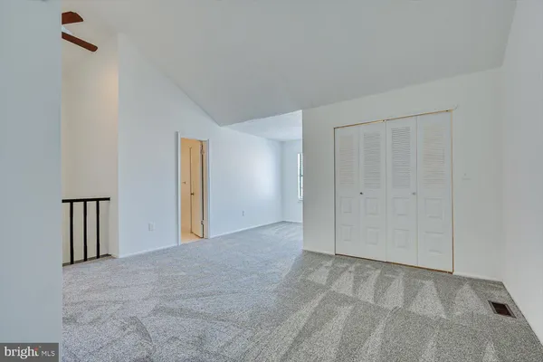 a view of an empty walk in closet