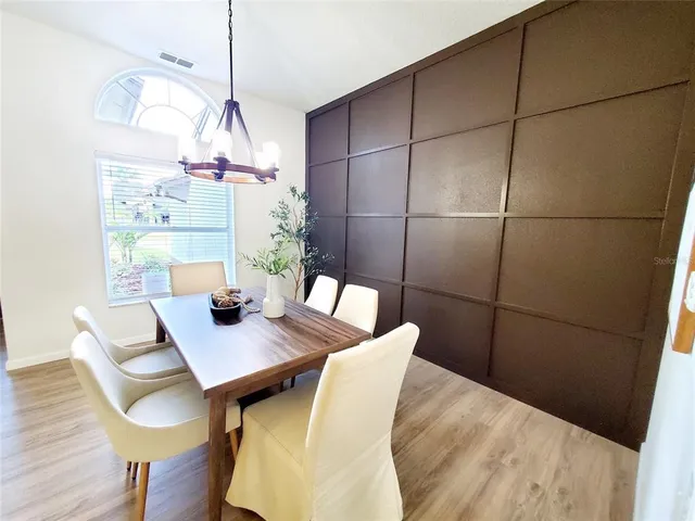 a view of a dining room with furniture