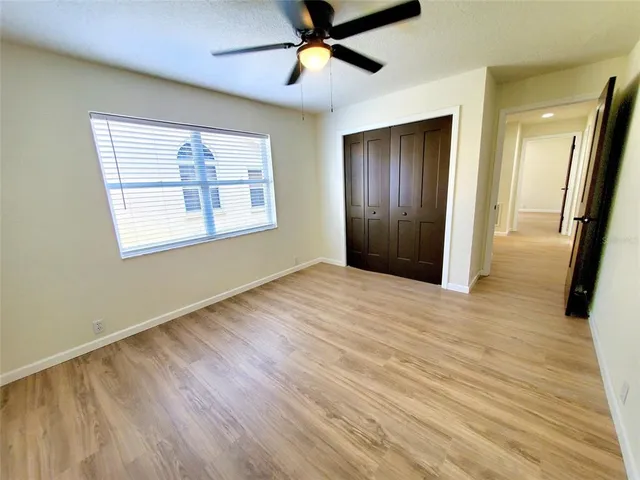 a bathroom with a toilet a sink and a mirror
