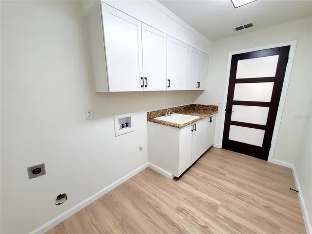 a view of swimming pool with seating area