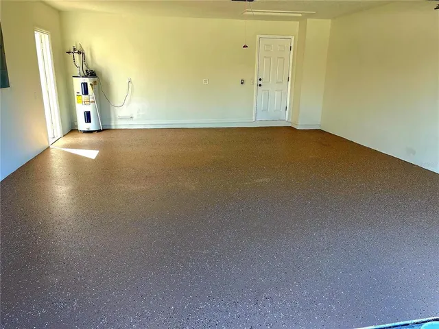 a view of swimming pool with seating area