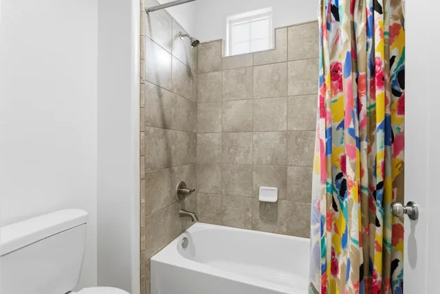 a view of a room with shelves and chandelier