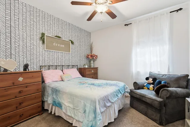 a utility room with sink dryer and washer