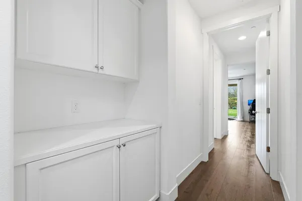 a bedroom with a bed and dresser