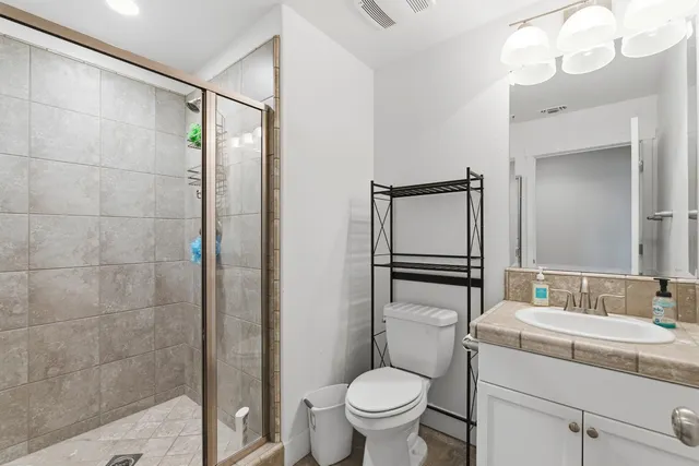 a view of an empty room with shelves