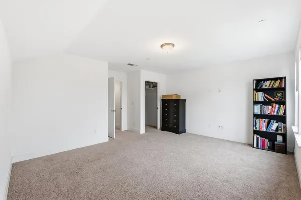 a view of a garden and basketball court