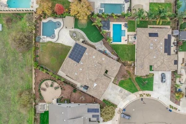 an aerial view of a swimming pool