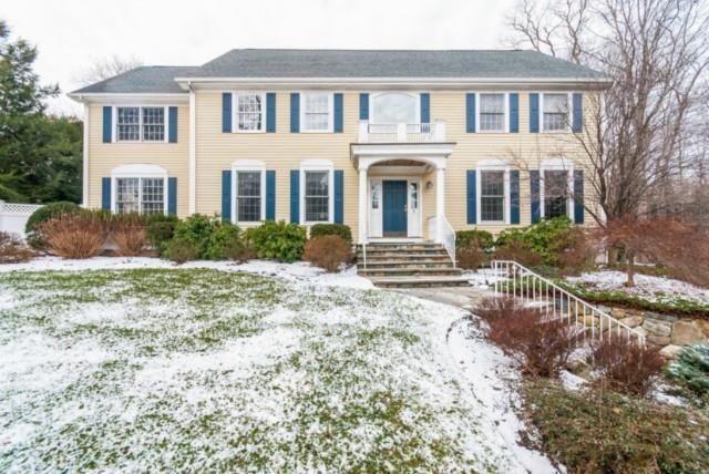 1 Crawford Road Westport, CT 06880 - Photo 1 of 1 a front view of a house with a yard and garage