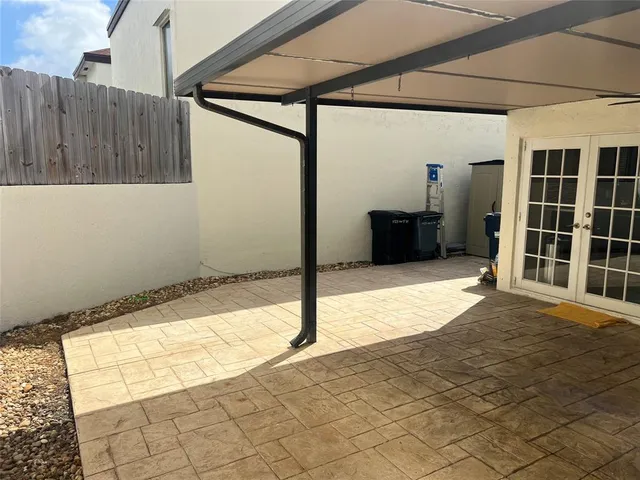 a view of a backyard of a house