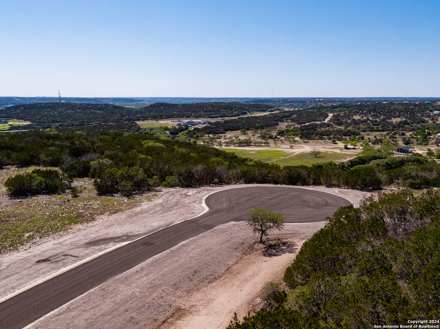 149 Branched Out Trail Kerrville, TX 78028 - Photo 9 of 10 an aerial view of a houses with a yard
