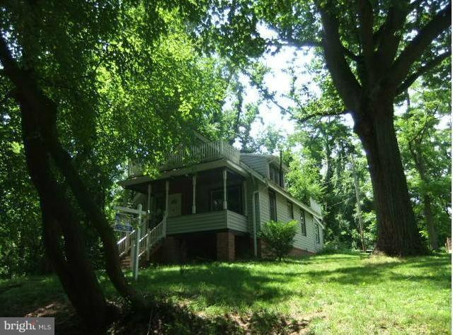 4210 Clarkdale Road Baltimore, MD 21209 - Photo 4 of 9 a view of a house with a yard