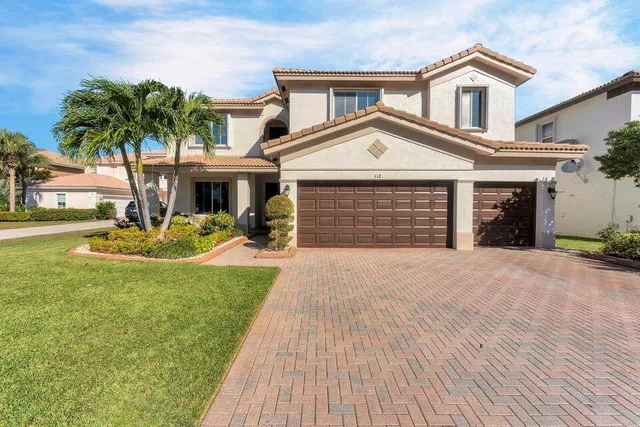 $879,999 | 112 Ibisca Terrace, Royal Palm Beach, FL 33411