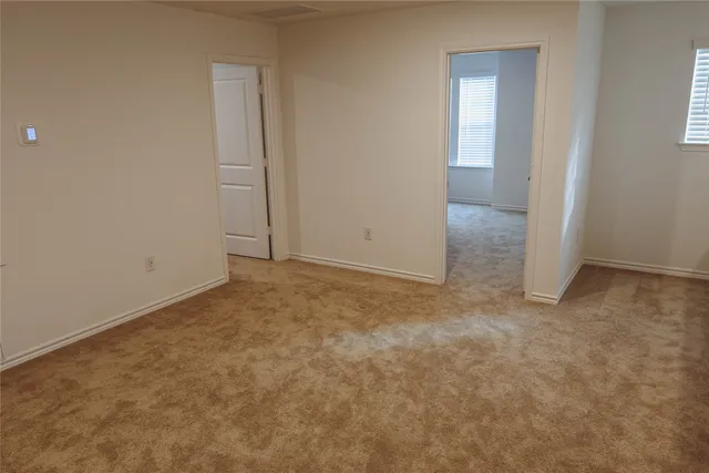 an empty room with an entryway