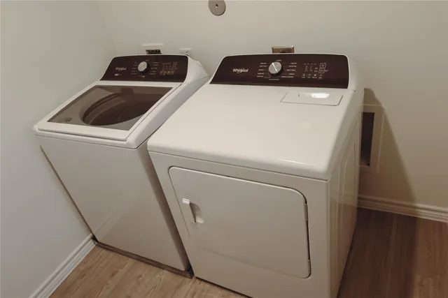 a utility room with dryer and washer