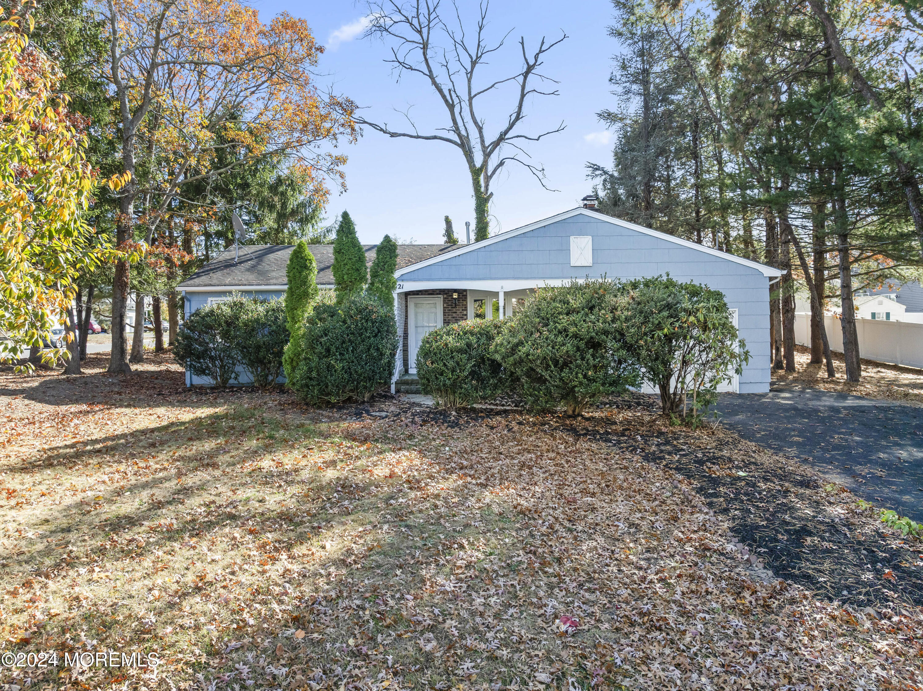 321 Float Avenue Manahawkin, NJ 08050 - Photo 21 of 31 a front view of a house with a yard