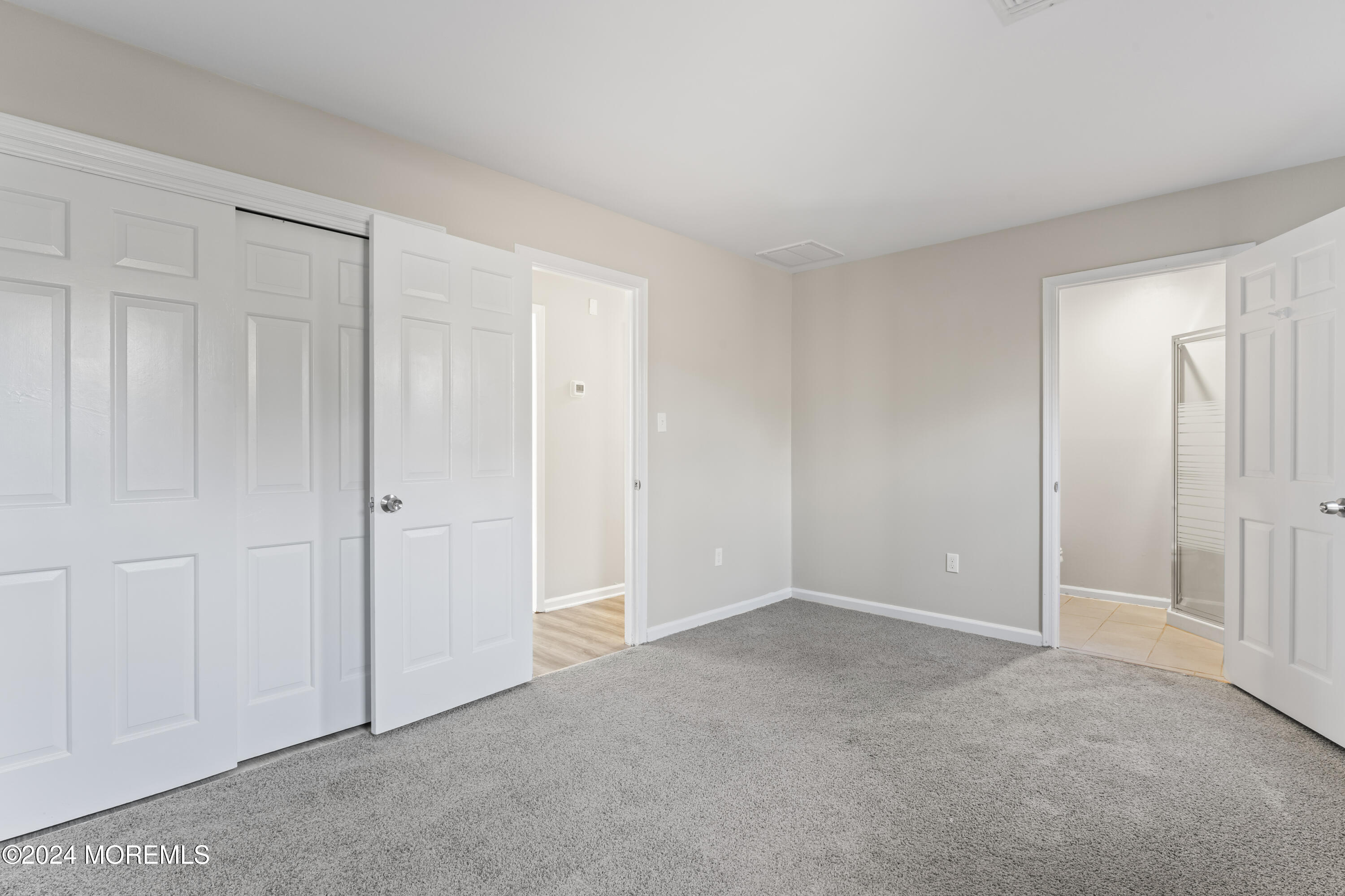 321 Float Avenue Manahawkin, NJ 08050 - Photo 5 of 31 a view of an empty room and closet area