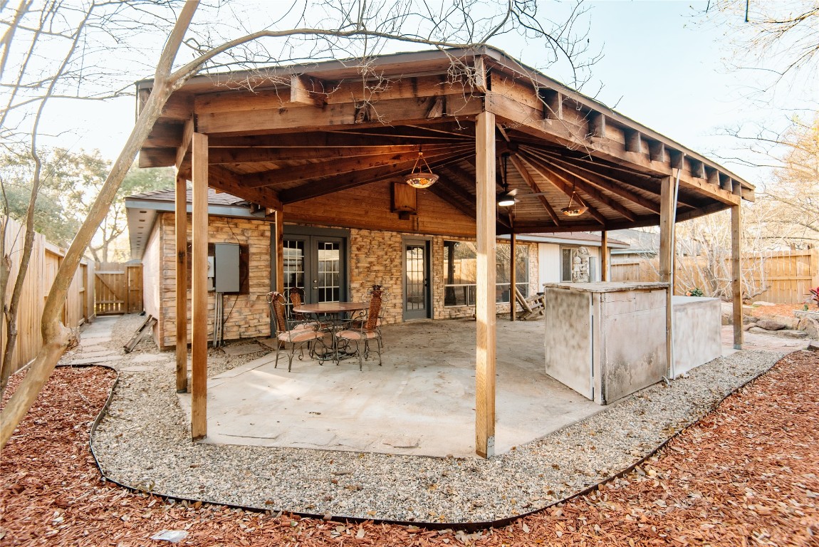21734 Nickerton Lane Spring, TX 77388 - Photo 12 of 31 Another angle of the custom cedar-wood covered patio and outdoor seating area.