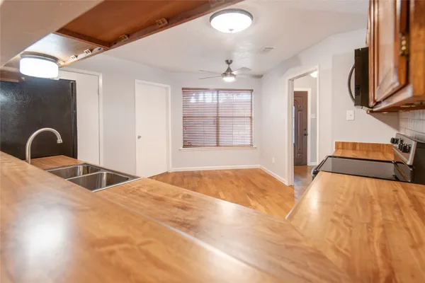 a view of a dining room with furniture