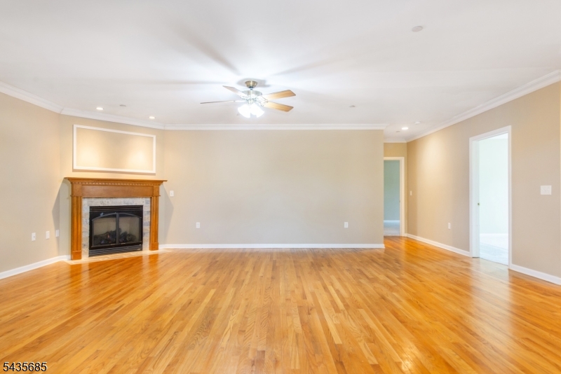 16 Main Street Sparta, NJ 07871 - Photo 11 of 33 a view of empty room with wooden floor and fan