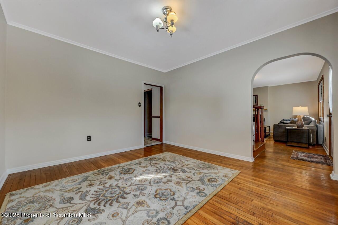 117 Griffin Pond Road Clarks Summit, PA 18411 - Photo 15 of 65 a view of a livingroom with wooden floor