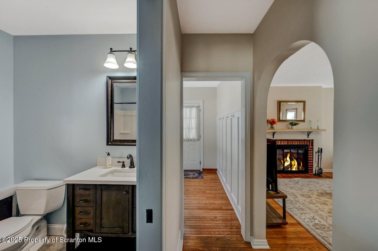 117 Griffin Pond Road Clarks Summit, PA 18411 - Photo 24 of 65 a view of a hallway with wooden floor and furniture
